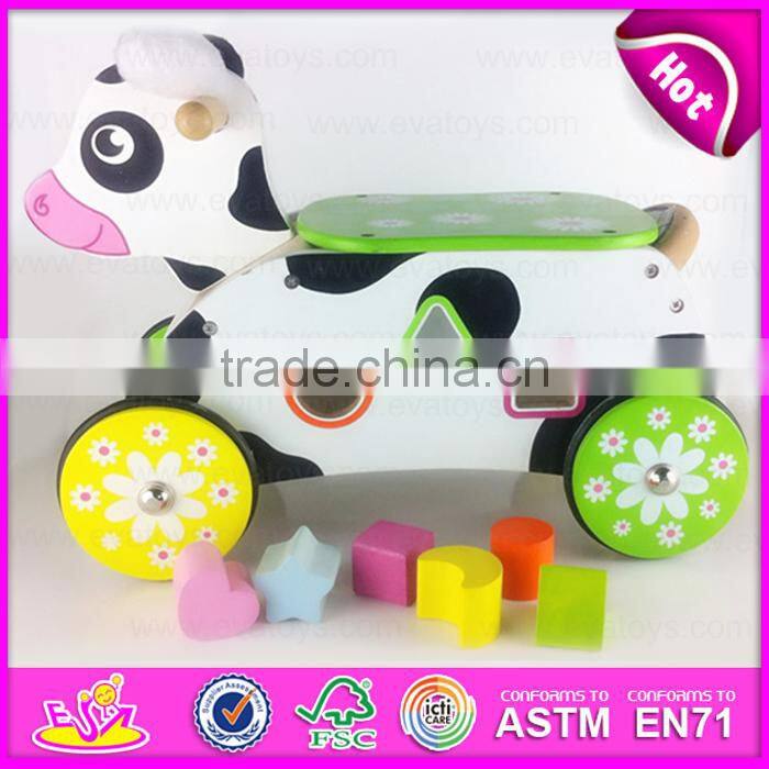 2015 Newly cheap kids wooden tricycle with blocks,Lovely rabbit design wooden tricycle,Comfortable Safe Wooden tricycle W16A018
