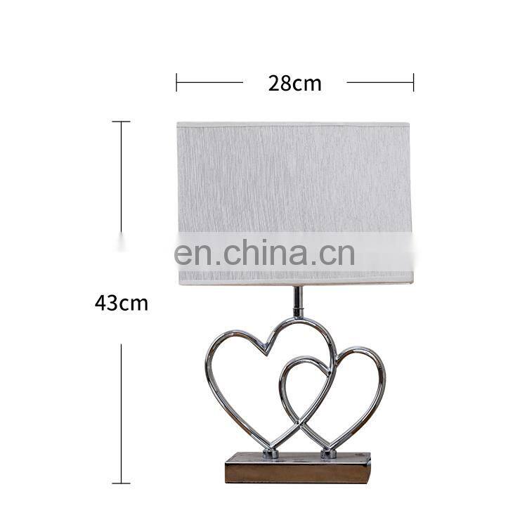Novel love theme heart shape custom table decoration metal base hotel custom bedside lamp with logo