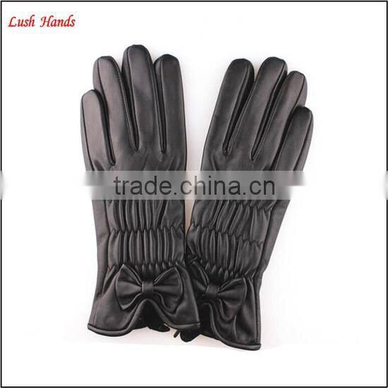 2015 lady's fashion black sheep leather gloves with bow