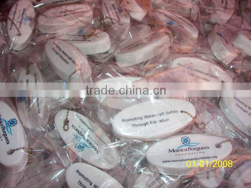 Custom made oval pu float key chain , floating sponge pu keychain