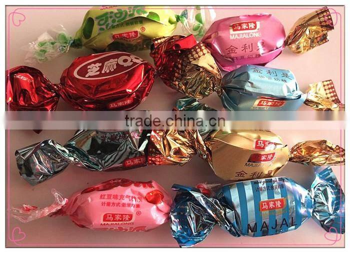 Automatic double twist sweet candy wrapper machine