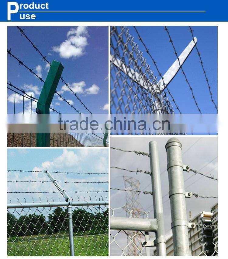 Chain link fence top barbed wire