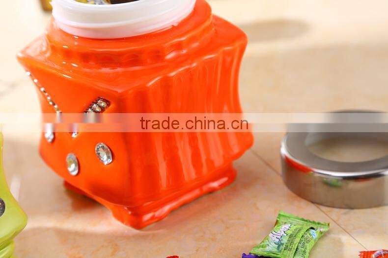 ceramic storage jar with metal stand