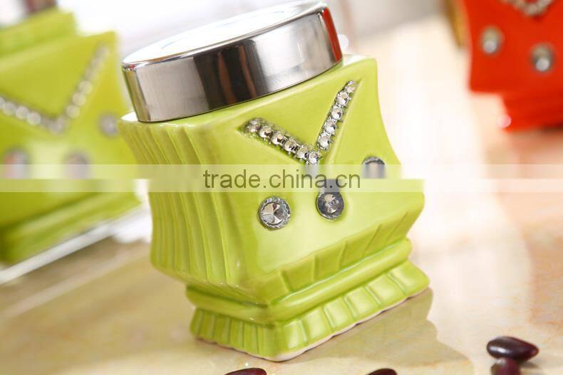 ceramic storage jar with metal stand