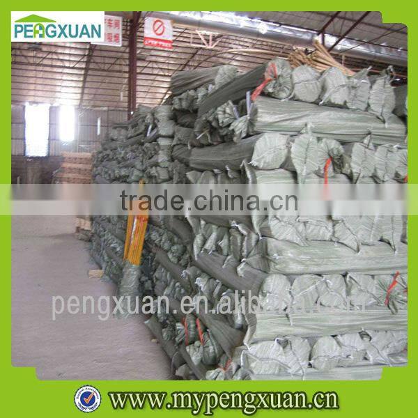 varnished wooden shovel handle garden stake