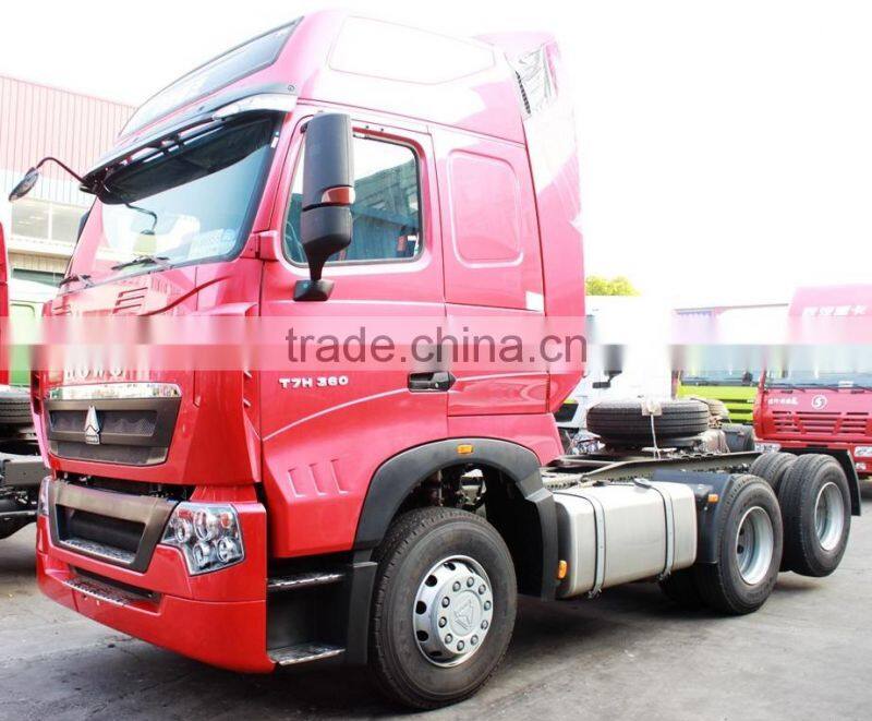 SINOTRUK HOWO T7H 6X2 440HP Euro4 MAN Engine Tractor Head Truck with Rear Axle Lifting