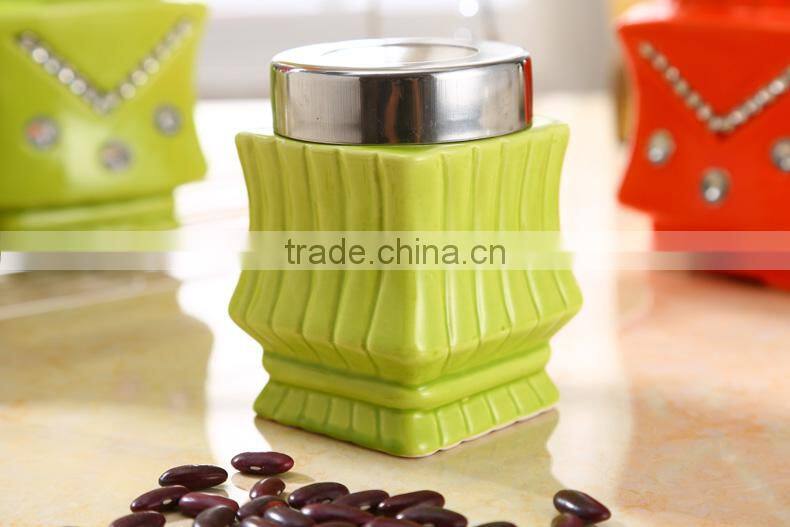 ceramic storage jar with metal stand