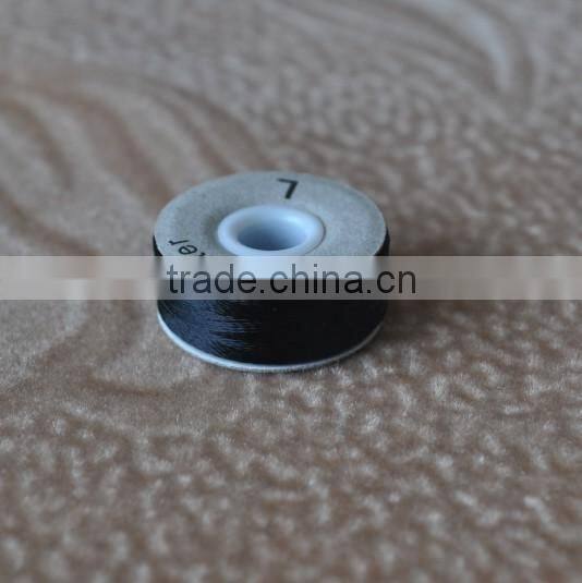 negro cardboard L bobbina prellenada