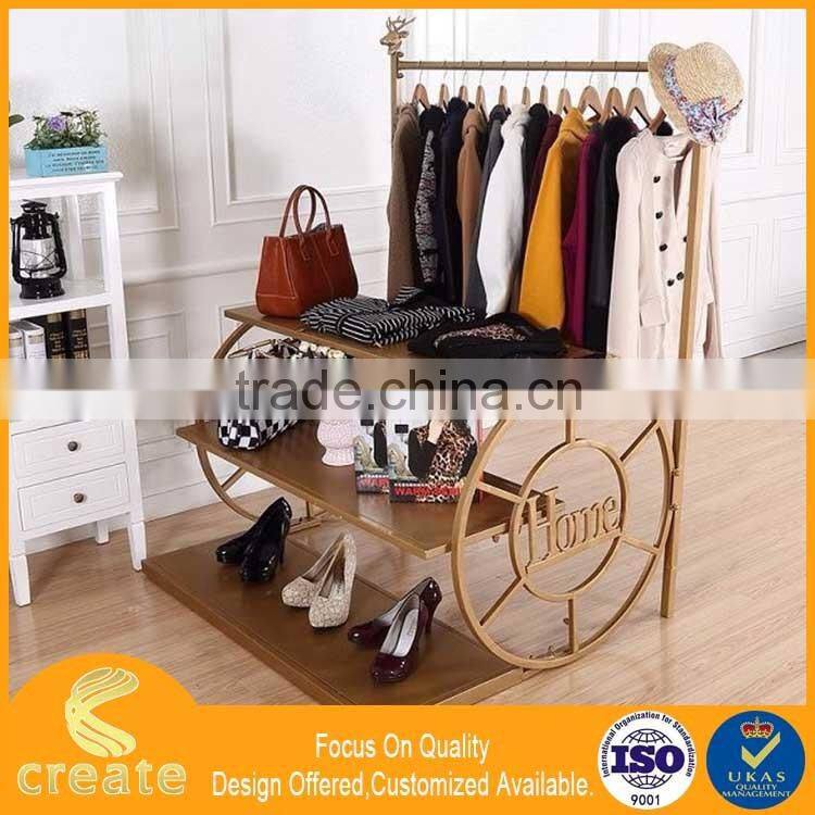 Clothing display stand for your boutique with build in shelf,metal clothes rack