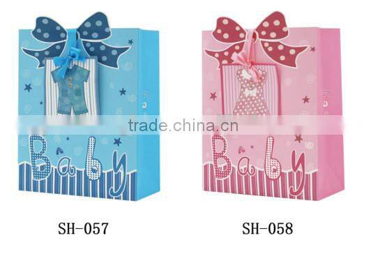 Hot popular baby series paper gift bag with company logo with ribbon handle made in china supplier and manufacture