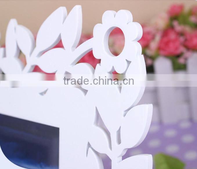 White carved wooden photo frame