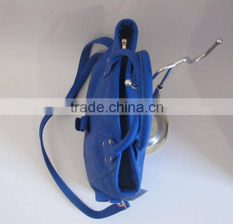 The foldable dark blue handbag trend leather handbags