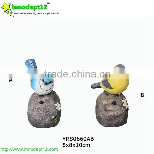set 2 garden decoration solar power bird caller with shadow control, and resin stone with flowers