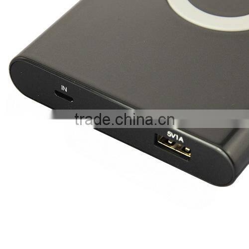 Portable Qi Certificated Wireless Charging Pad With 7000mAh External Battery For Mobilephones Tablets