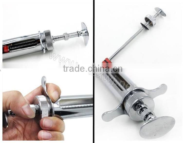 vet and animal using copper metal Automatic Syringe