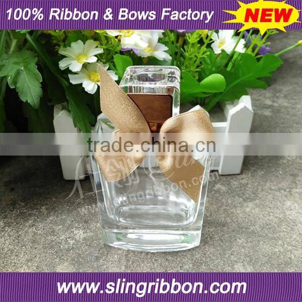 Satin & Lurex Ribbon Bow On Perfume Bottle