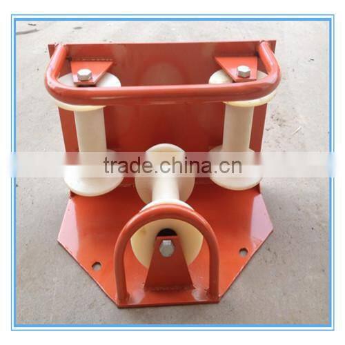 Ground cable roller, cable block