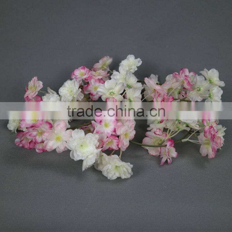 Artificial colourful cherry blossom garland for window display