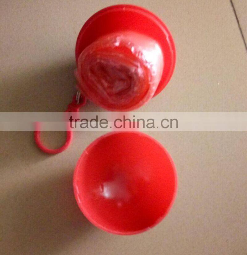 15121502 rain poncho used for one time,Promotional keychain Disposable Rain coat egg,custom logo print disposable raincoat