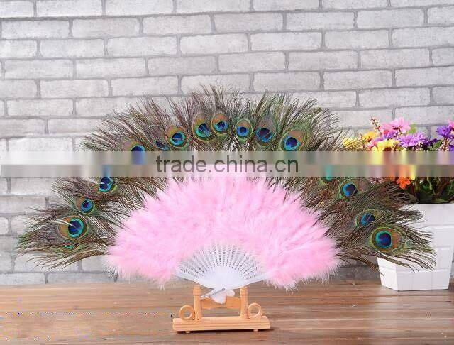 Colorful plastic peacock feather hand fan
