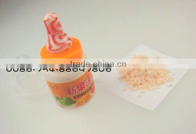 Nipple bottie with sour powder candy