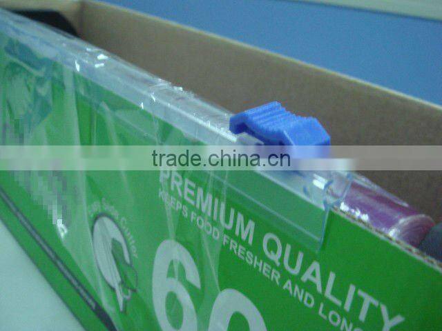 Plastic slide cutter for cling film - push-on type