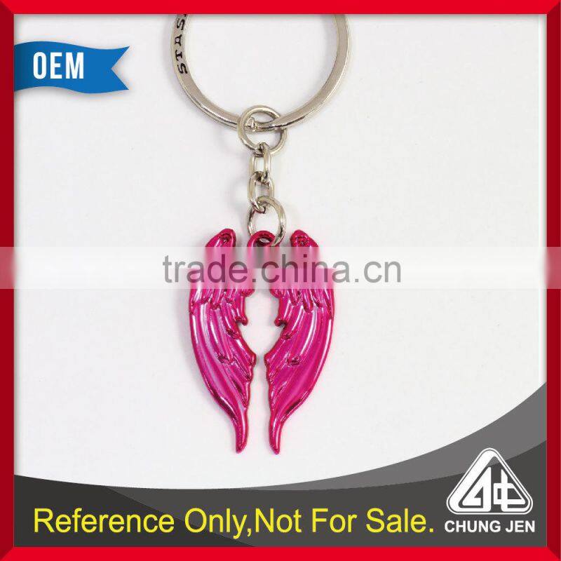Hot sales zinc alloy custom angel shaped wings keychain