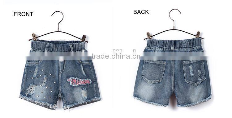 China apparel factory elastic ribbon waistband kids printed shorts jeans with hole