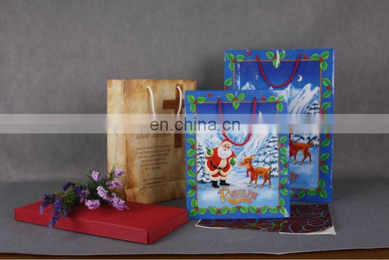 2014Garment package bag with rope handle Cheap white paper bag C1S gift paper bag