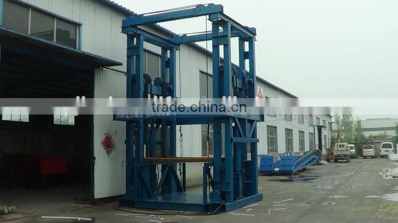 SJG model chain guide rail type hydraulic lift platform for cargo delivery