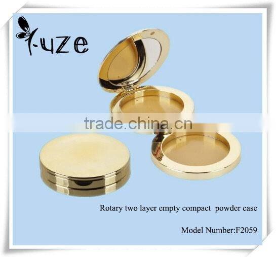 Rotary two layer empty compact powder case