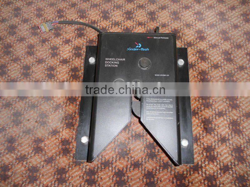 Wheelchair docking system for the disabled