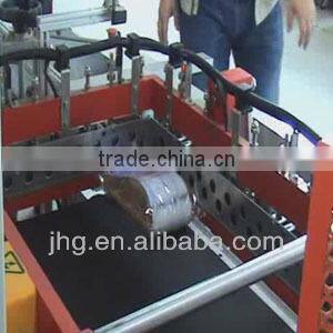 Automatic L-bar shrink wrap machine