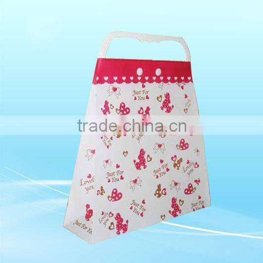 Red shopping paper bags with satin handle