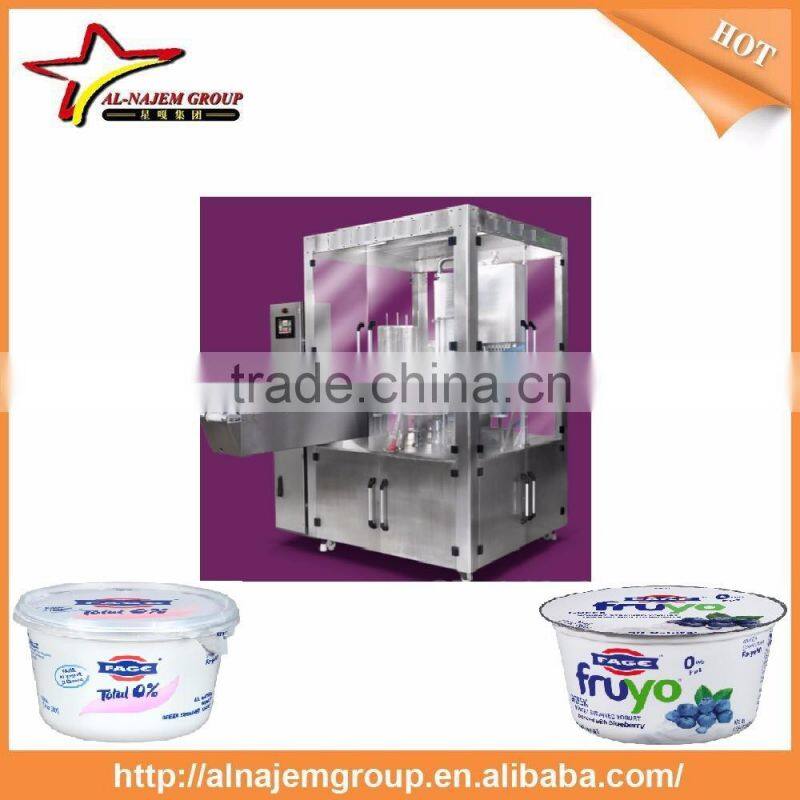 machine filling of yogurt and closing