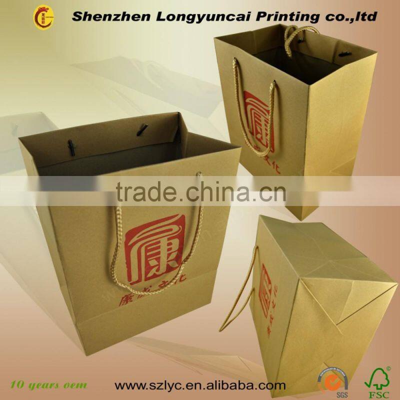 Chinese factory OEM food packaging round hole handle custom paper bag