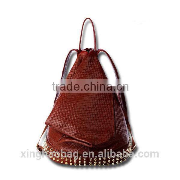 Hot selling fashionable triangle shaped leather backpack with rivet