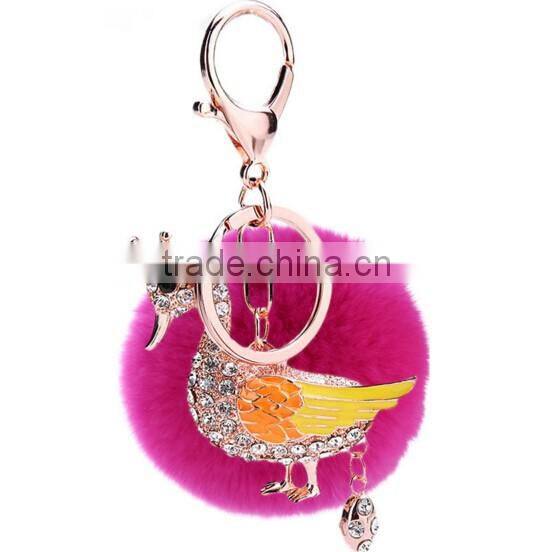 Hot selling rhinestone swan keychain with pink rabbit fur ball