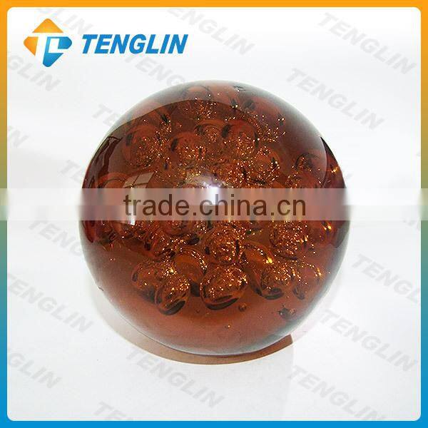 Handmade glass ball paperweight with bubble