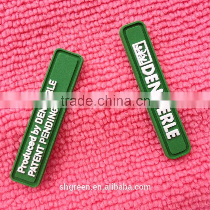 Orange color PVC rubber side label,sewing on rubber flag tag for jacket