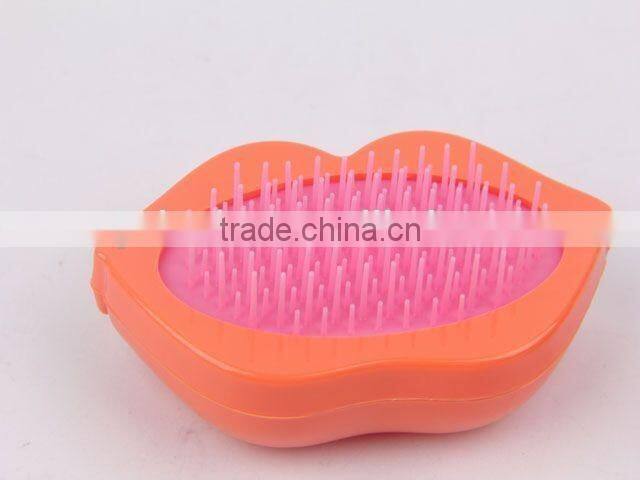 Lip shaped plastic massage comb with mirror/hair brush