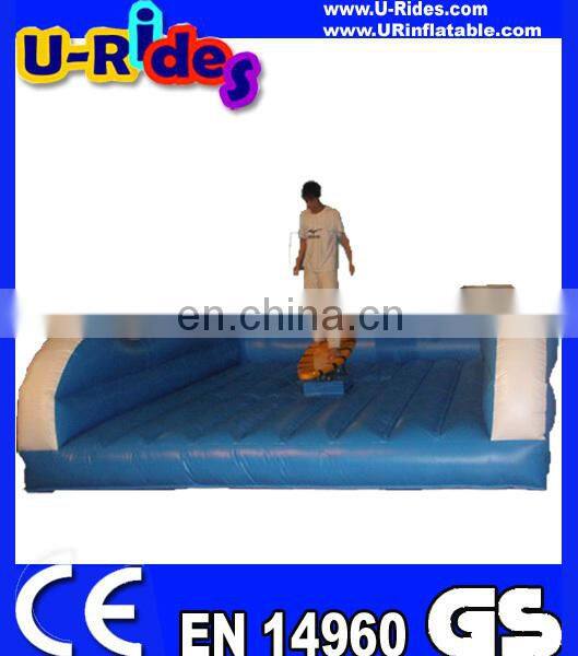 Exercise surfboard simulator rides inflatable game