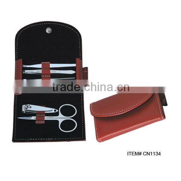 Red PVC pouch carbon steel manicure set in a purse