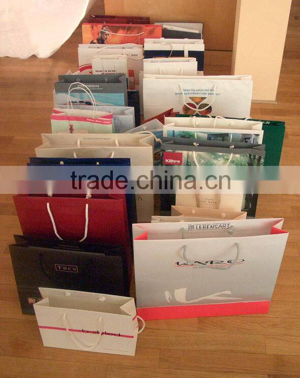 2014 Customized paper carrier bag with colorful ribbon ,beautifl and fashion ribbon paper bag free sample wholesale