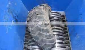 Tire shredder/ recycling machine