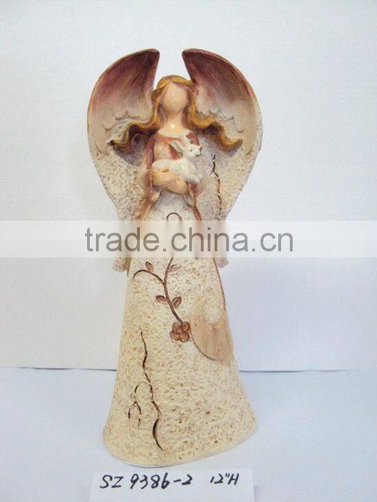 Resin fairy with a snail statue sculpture