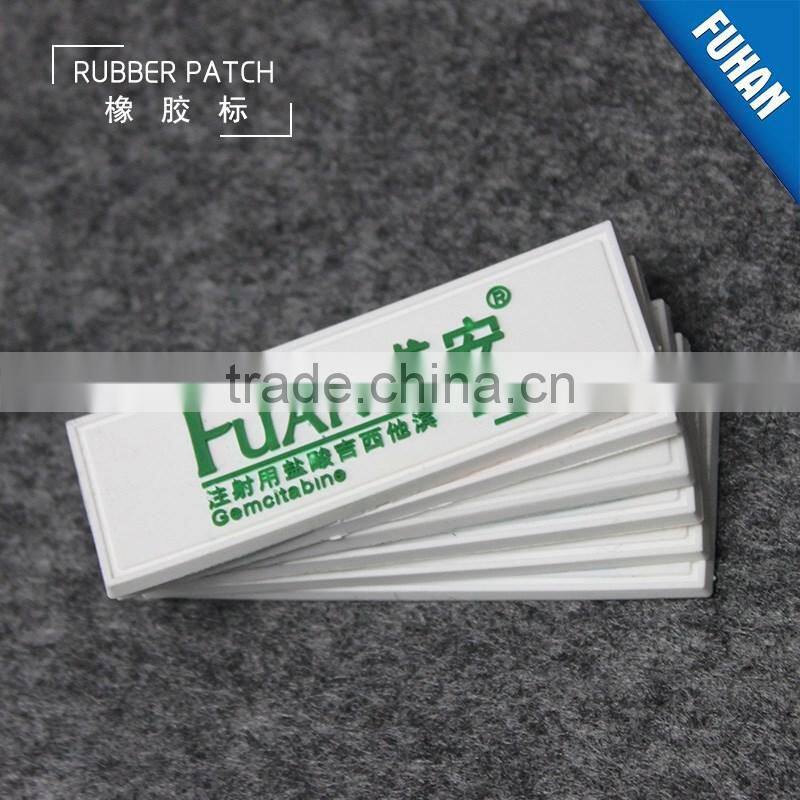 Embossed Custom White Background PVC Rubber Patch Logo