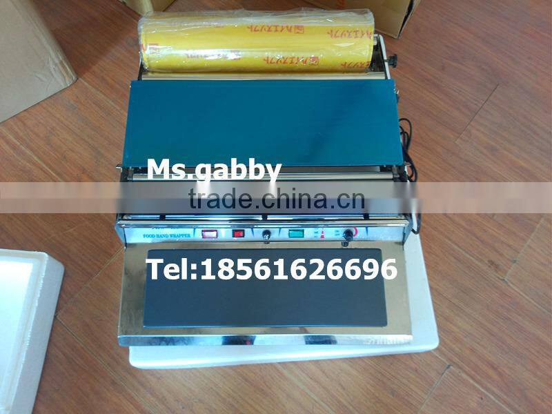 Cling film packing machine for supermarket