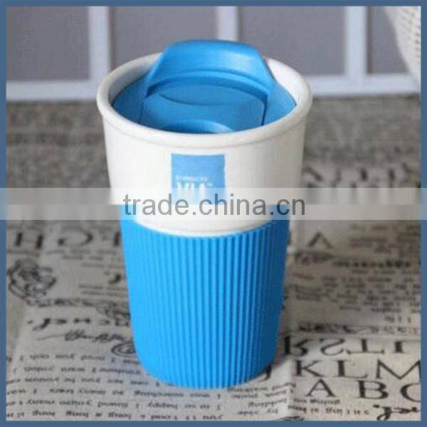 Modern simple ceramic travel coffee mug with silicone sleeve and lid