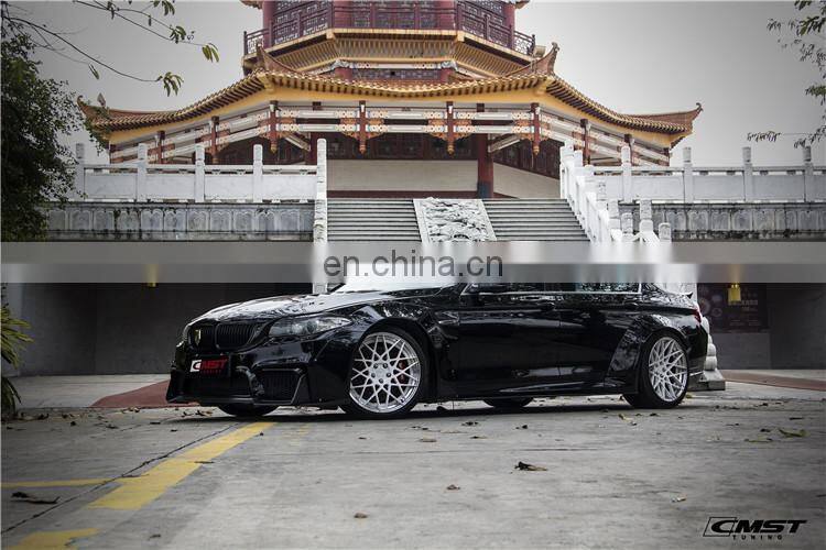 Widebody kit for BMW 5 series F10 F18 CMST style front bumper rear bumper wide flare side skirts trunk spoiler fenders facelift